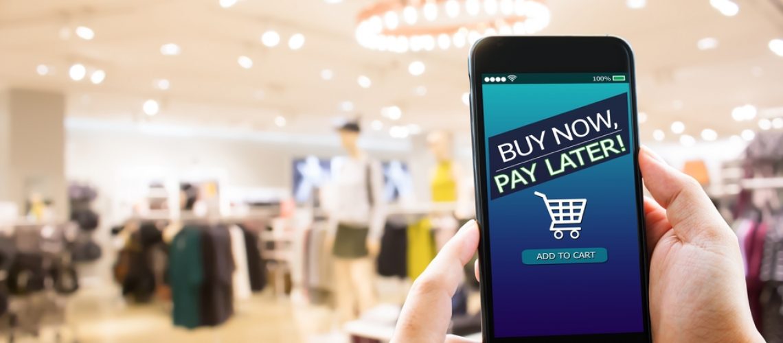 Bnpl,Buy,Now,Pay,Later,Online,Shopping,Concept.hands,Holding,Mobile